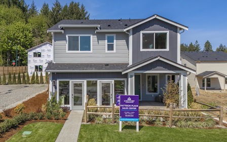 A house with a fence around it.