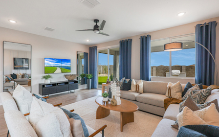 A living room with a large window.
