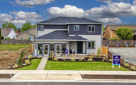A house with a fence around it.