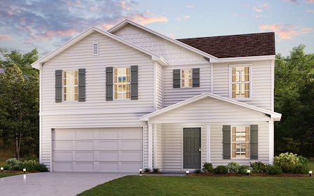 A white house with a lawn.