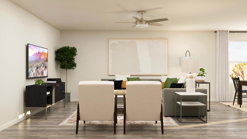 A room with a white board and chairs.