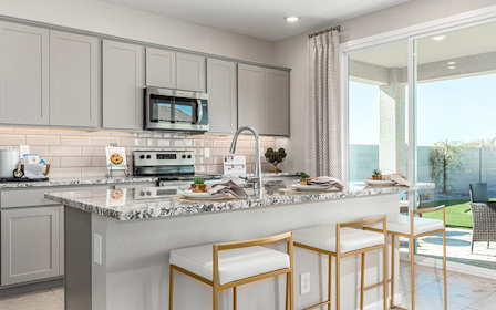 A kitchen with a large island.