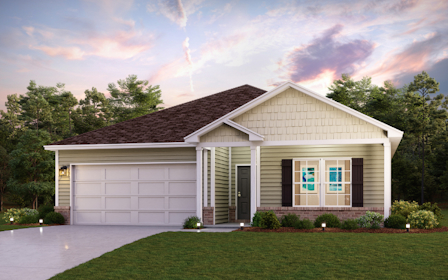 A house with a lawn in front of it.